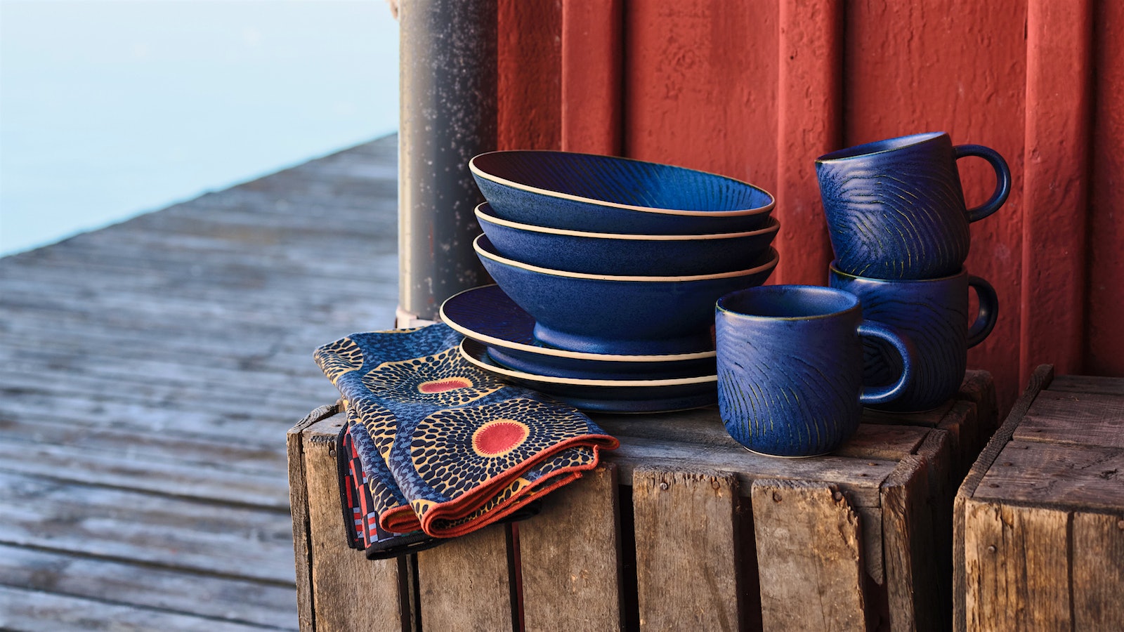 West Elm Marcus Samuelsson tableware at a marina in Smogen, Sweden.